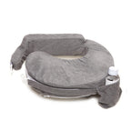 A gray, U-shaped breastfeeding pillow with a soft, plush texture. It features a side pocket holding a water bottle, highlighting practicality and comfort.