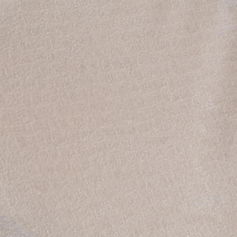 Close-up of a light beige textured surface, resembling soft fabric or suede. The subtle creases create a gentle, calming pattern.