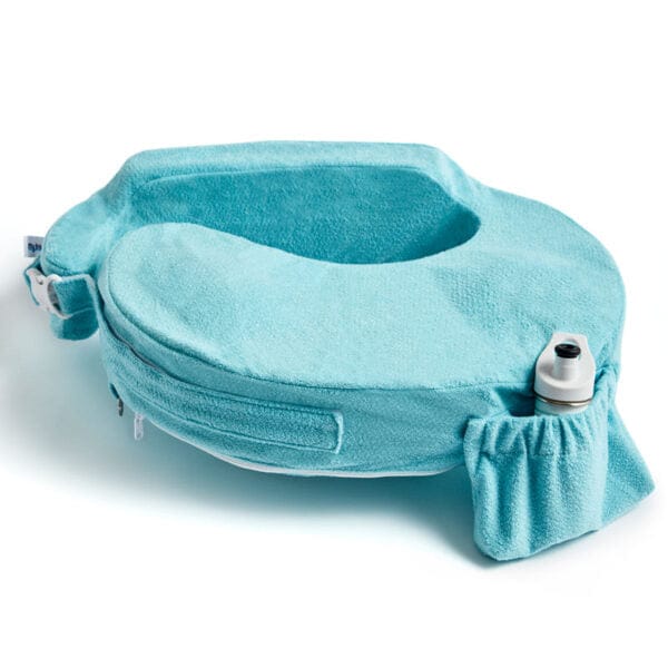 Light blue, U-shaped nursing pillow with a pocket and adjustable strap. It features a bottle holder, conveying practicality and comfort.