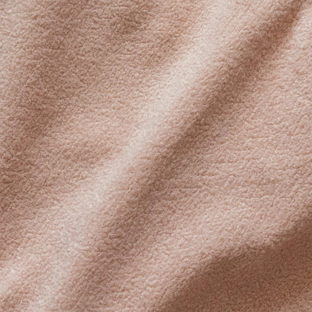 Close-up of beige fabric texture