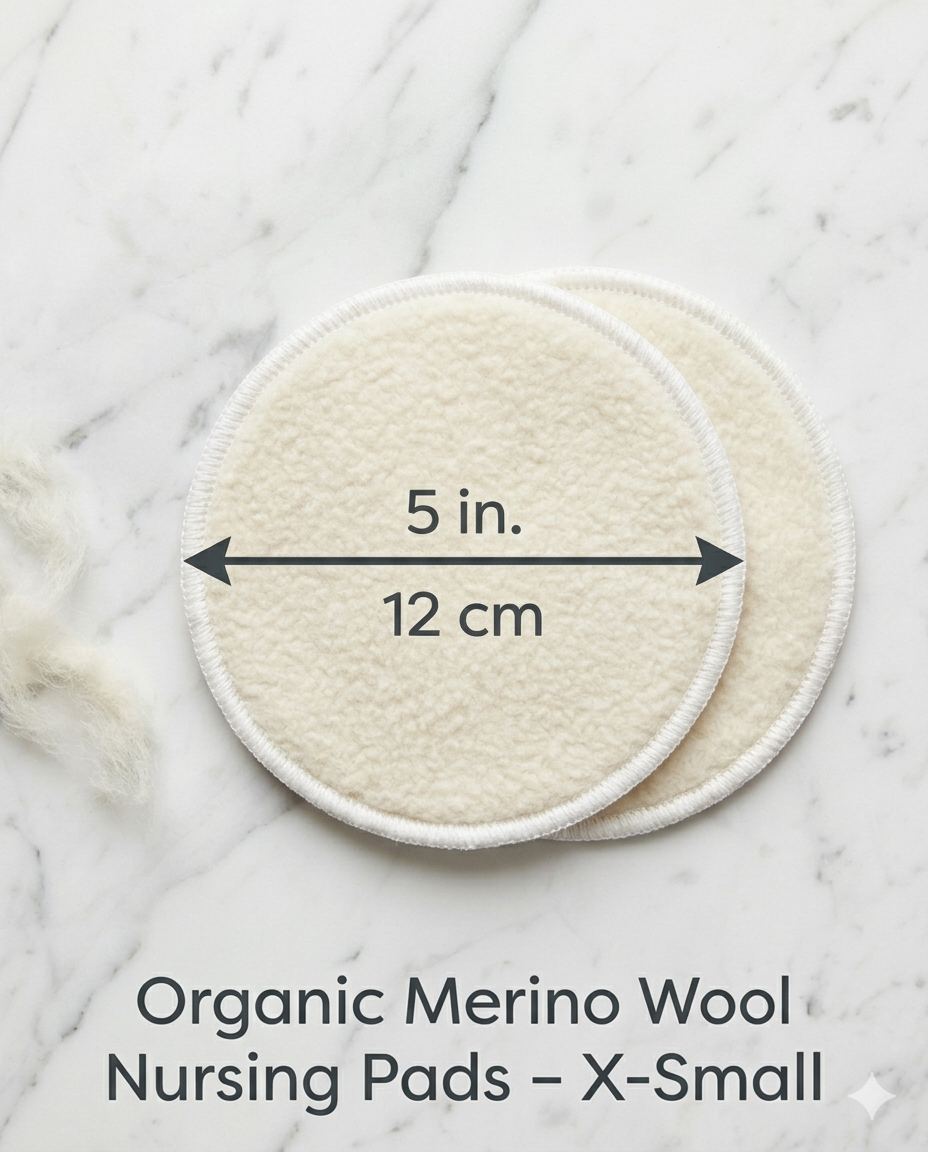 Two organic merino wool nursing pads on a marble surface with measurements and text.