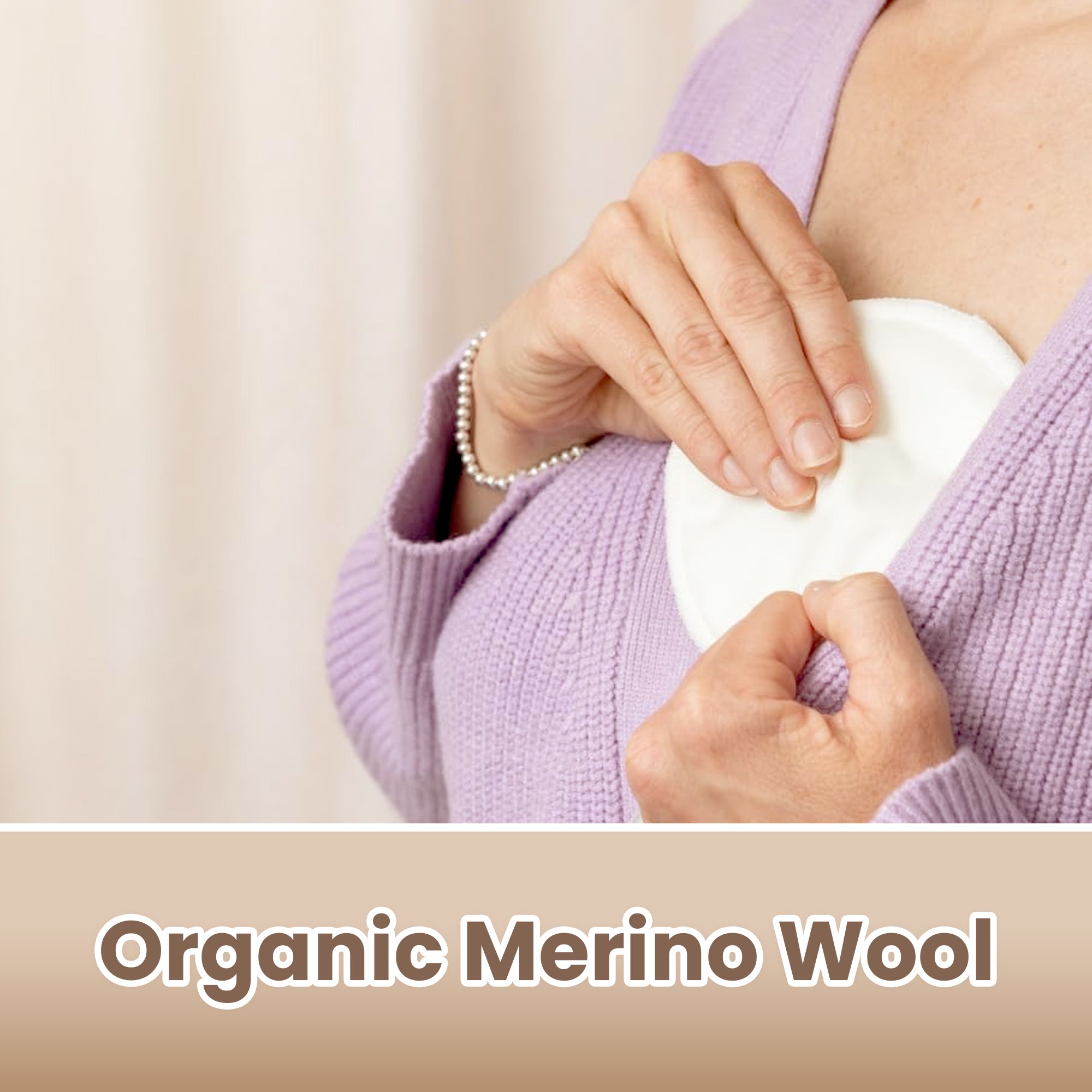 Person wearing a purple sweater holding a white organic merino wool product against a beige background.