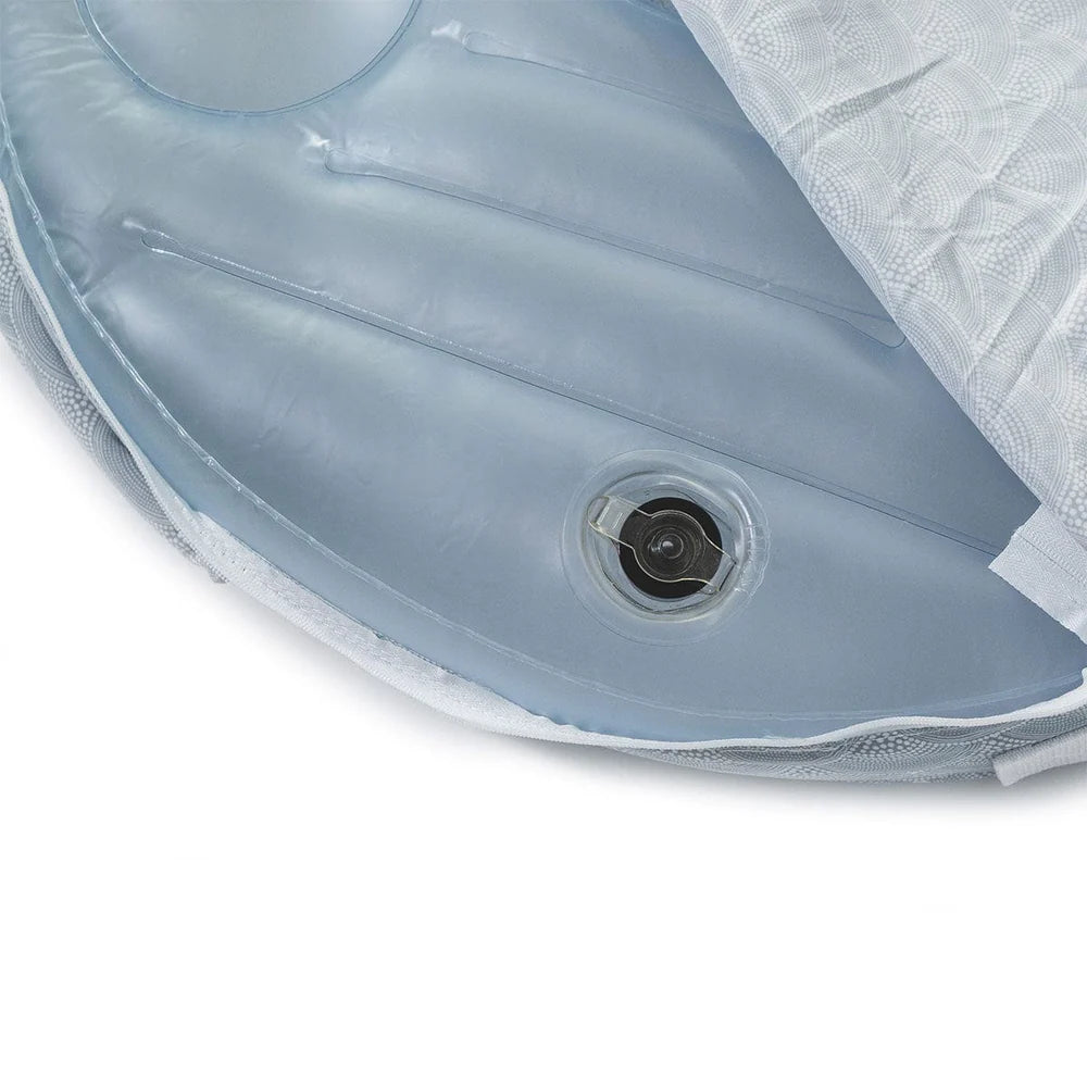 Inflatable air mattress with valve on a white background