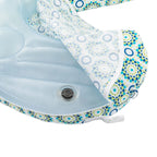 Inflatable pool with patterned cover on a white background