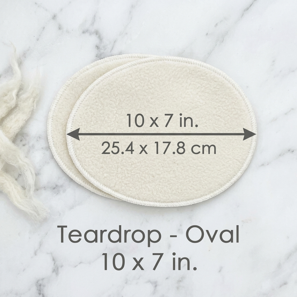 Teardrop-shaped oval item with measurements on a marble background