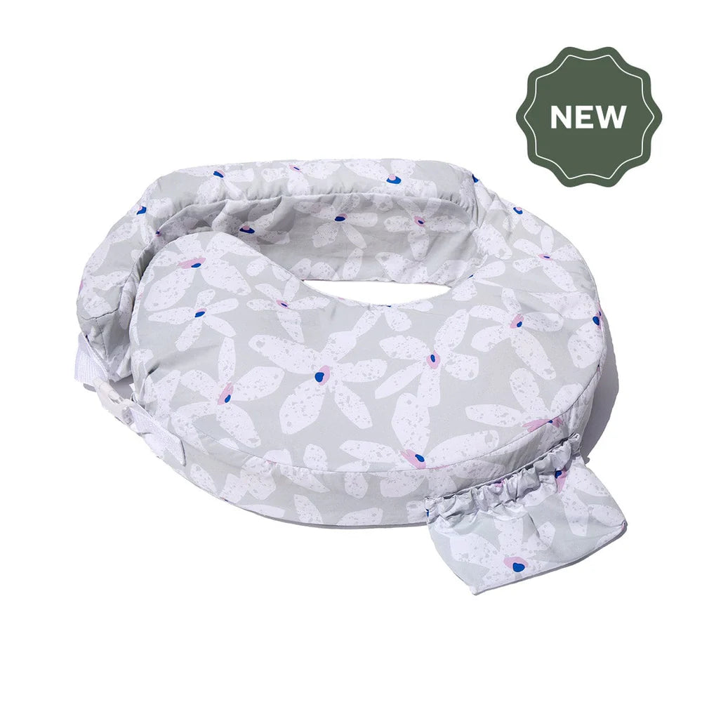White bib with floral pattern on a white background, featuring a 'NEW' label.