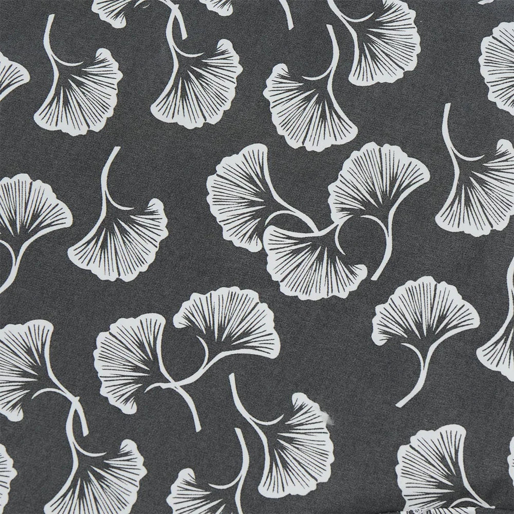 Pattern of white leaves on a black background