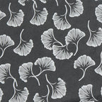 Pattern of white leaves on a black background